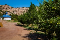 Fruit trees line the walk to the chapel.